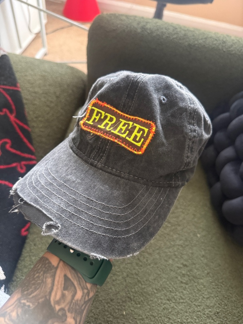 Distressed Black Baseball Cap with "FREE" Patch